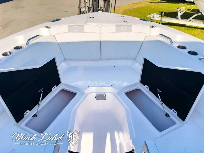 Slide: The Image of 2025 Sea Fox 268 Traveler Dual Console boat interior with open storage compartments. - 7