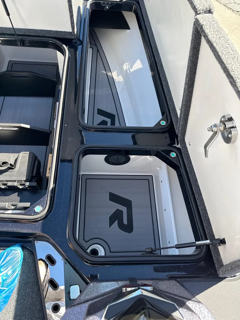 Slide: The Image of 2024 Ranger Z521R boat storage compartments with sleek design and modern features. - 4