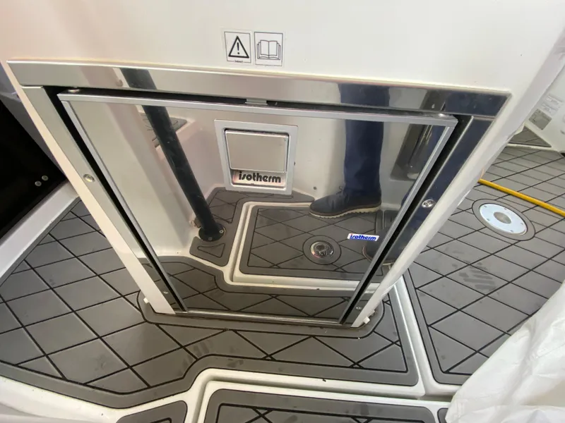 Slide: The Image of Jeanneau Leader 7.5 2022 boat interior with Isotherm fridge and non-slip flooring. - 17