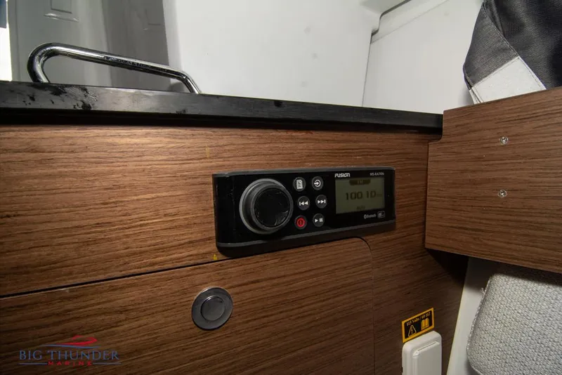 Slide: The Image of Audio control panel on 2022 Jeanneau Leader 7.5 boat interior. - 22