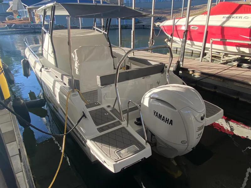 Slide: The Image of 2022 Jeanneau Leader 7.5 boat with Yamaha engine docked in marina. - 32