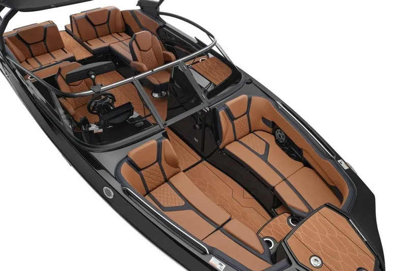 Slide: The Image of 2026 Yamaha Boats 255XD interior with luxurious brown seating and sleek black design. - 2