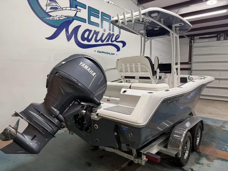 Slide: The Image of 2025 Tidewater 210LXF boat with Yamaha engine in showroom. - 3