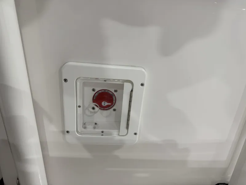 Slide: The Image of 2025 Tidewater 210LXF boat battery switch panel, white background. - 38
