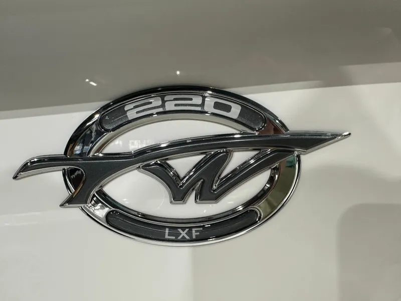 Slide: The Image of Tidewater 220LXF 2025 model emblem on a sleek white surface. - 29