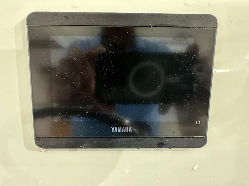 Slide: The Image of Yamaha display screen on 2025 Tidewater 320cc boat dashboard. - 33