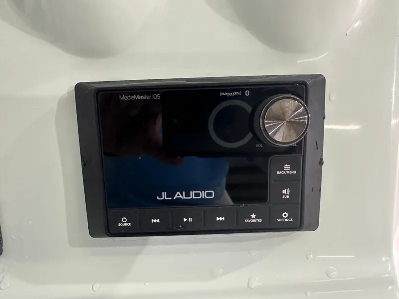 Slide: The Image of JL Audio MediaMaster 105 control panel on 2025 Tidewater 320cc boat. - 34