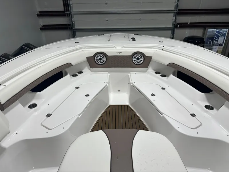 Slide: The Image of 2025 Tidewater 320cc boat interior with seating and storage compartments. - 41