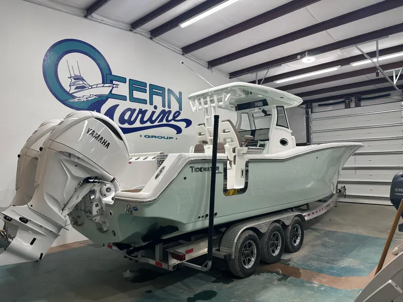 Slide: The Image of 2025 Tidewater 320cc boat with Yamaha engines in Ocean Marine Group showroom. - 6