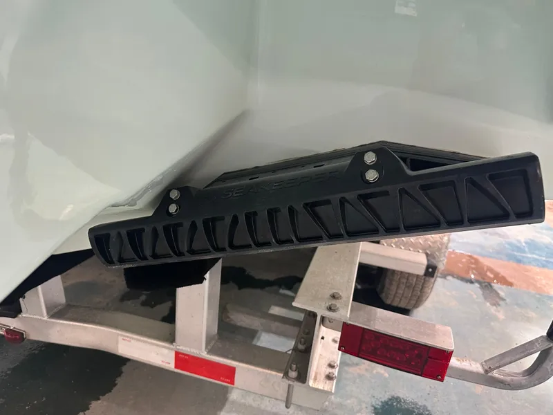 Slide: The Image of 2025 Tidewater 320cc boat on trailer, featuring Seakeeper stabilizer. - 8