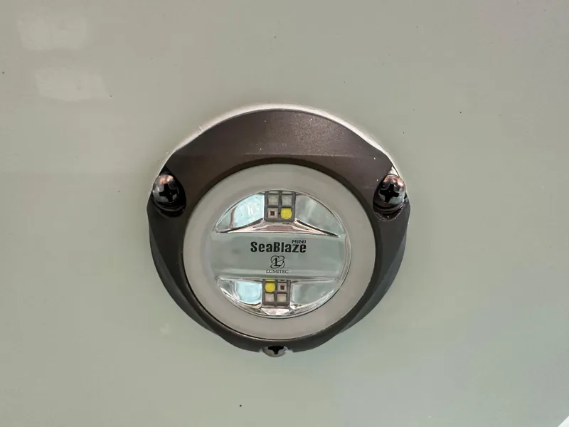 Slide: The Image of SeaBlaze Mini underwater light on 2025 Tidewater 320cc boat. - 9