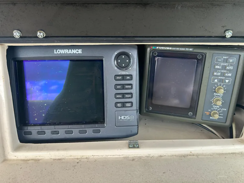 Slide: The Image of Lowrance and Furuno marine electronics on 1997 Grady-White 232 Gulfstream boat. - 12
