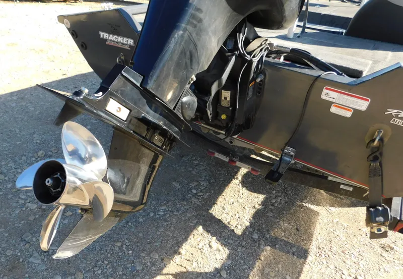 Slide: The Image of 2015 Tracker Pro Team 190 TX boat motor and propeller detail. - 19