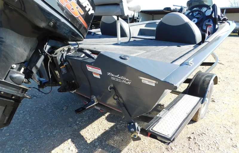 Slide: The Image of 2015 Tracker Pro Team 190 TX boat, rear view with motor and trailer. - 21
