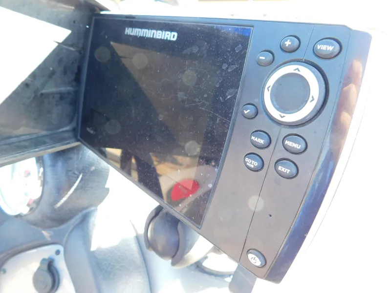Slide: The Image of Humminbird fish finder on 2015 Tracker Pro Team 190 TX boat dashboard. - 24