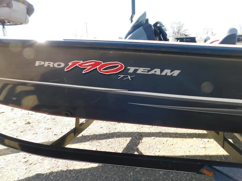 Slide: The Image of 2015 Tracker Pro Team 190 TX boat side view with logo. - 3