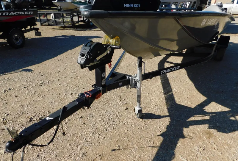 Slide: The Image of 2015 Tracker Pro Team 190 TX boat on trailer, Minn Kota motor visible. - 30