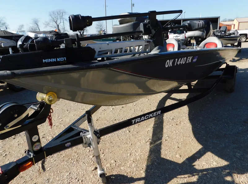 Slide: The Image of 2015 Tracker Pro Team 190 TX boat on trailer, featuring Minn Kota motor. - 31