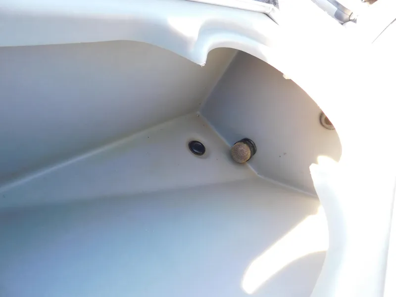 Slide: The Image of 2015 Tracker Pro Team 190 TX boat interior detail, showing storage compartment. - 34