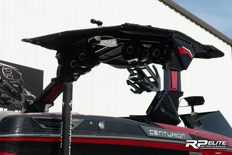 Slide: The Image of 2024 Centurion Ri245 boat with sleek design and advanced features. - 16