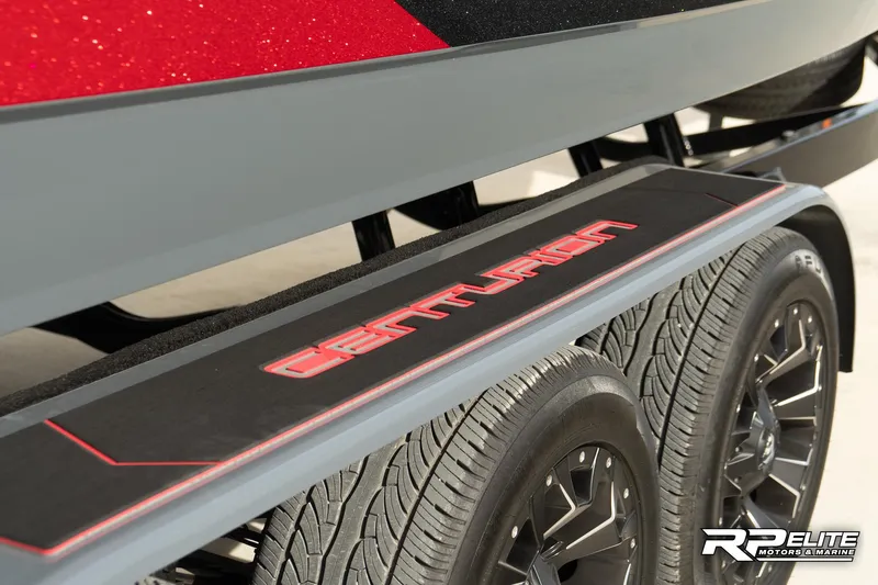 Slide: The Image of 2024 Centurion Ri245 boat trailer with dual wheels and branded step pad. - 19