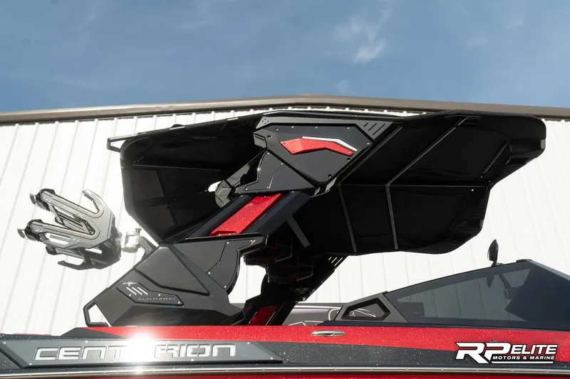 Slide: The Image of 2024 Centurion Ri245 boat with sleek design and modern features, showcased outdoors. - 21
