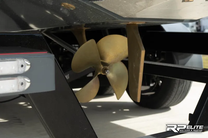 Slide: The Image of 2024 Centurion Ri245 boat propeller and trailer detail. - 36