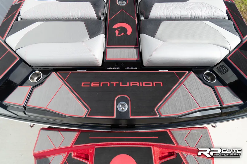 Slide: The Image of 2024 Centurion Ri245 boat interior with sleek design and red accents. - 42