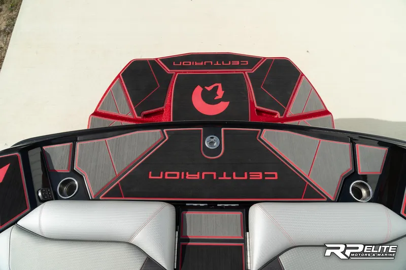 Slide: The Image of 2024 Centurion Ri245 boat deck with red and black design, featuring Centurion branding. - 46