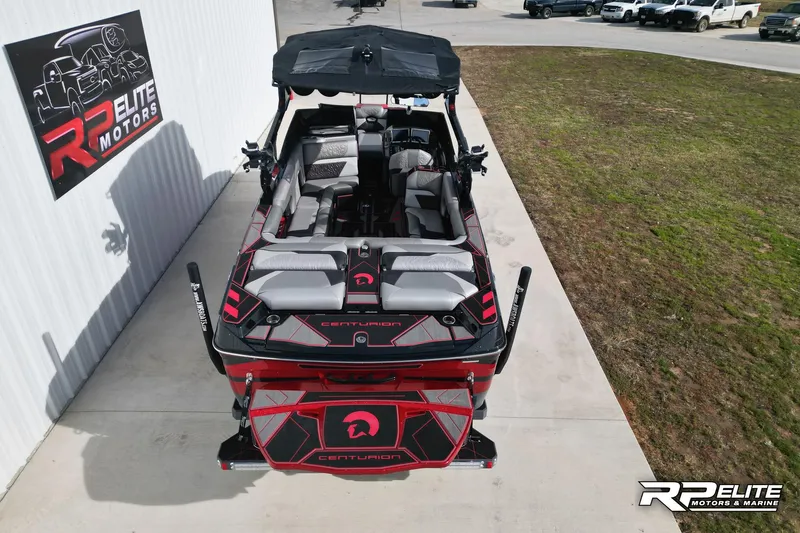 Slide: The Image of 2024 Centurion Ri245 boat with sleek design at RP Elite Motors. - 5