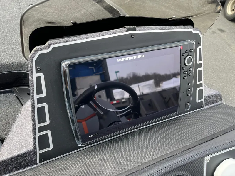 Slide: The Image of Humminbird Helix 7 fishfinder on 2025 Ranger Z520 boat dashboard. - 6