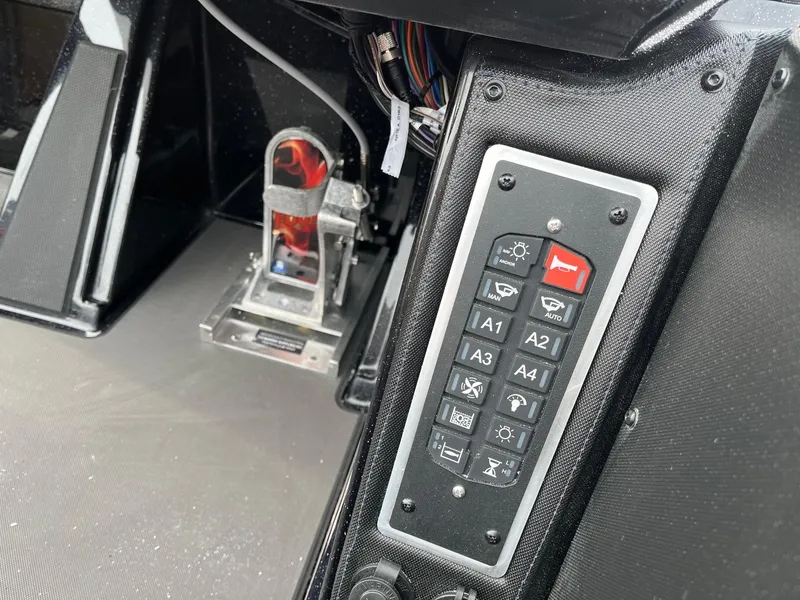 Slide: The Image of Control panel and foot pedal in 2025 Ranger Z520 boat cockpit. - 7