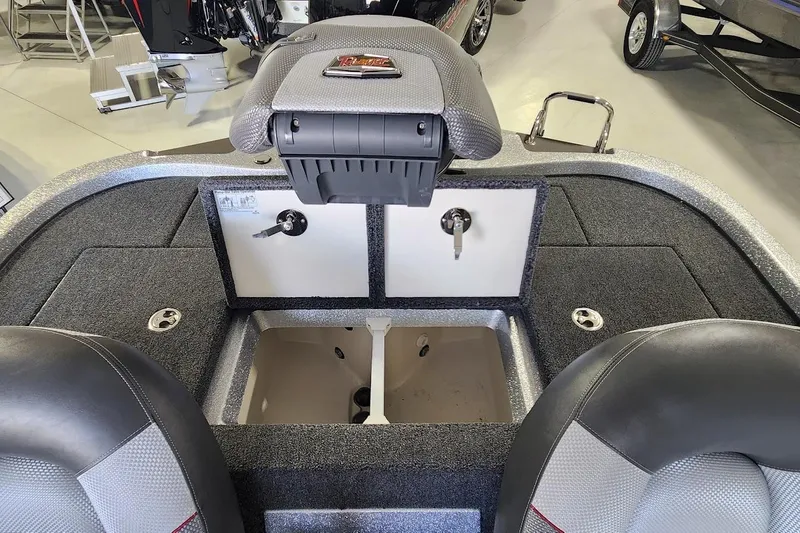 Slide: The Image of 2025 Ranger Z185 boat interior with storage compartments and seating. - 10