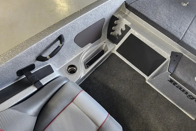 Slide: The Image of Interior of 2025 Ranger Z185 boat, featuring seating and storage compartments. - 6