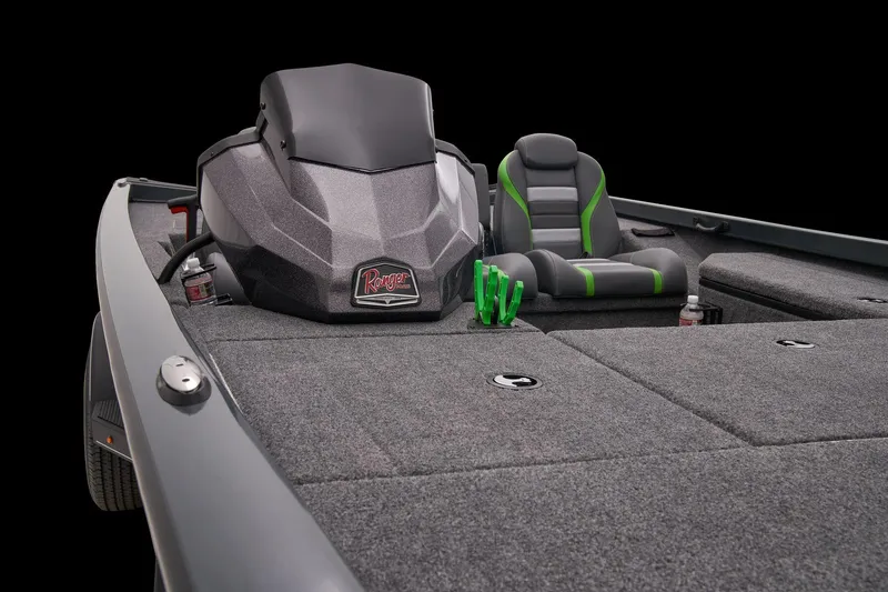 Slide: The Image of 2025 Ranger RT178 boat with cover on trailer, parked by a scenic lake. - 15