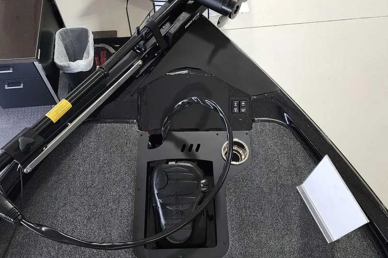 Slide: The Image of 2025 Ranger Z185 boat interior with trolling motor and control panel. - 3