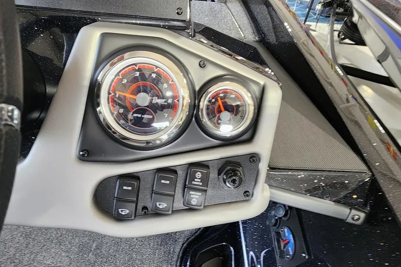 Slide: The Image of 2025 Ranger Z185 dashboard with gauges and control switches. - 9