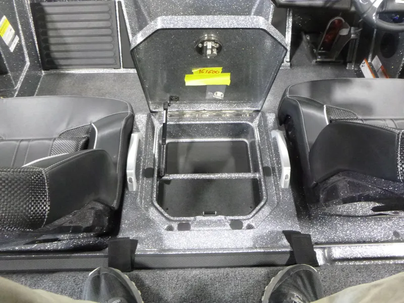 Slide: The Image of Interior of a 2025 Ranger Z520 boat showing seating and storage compartment. - 13