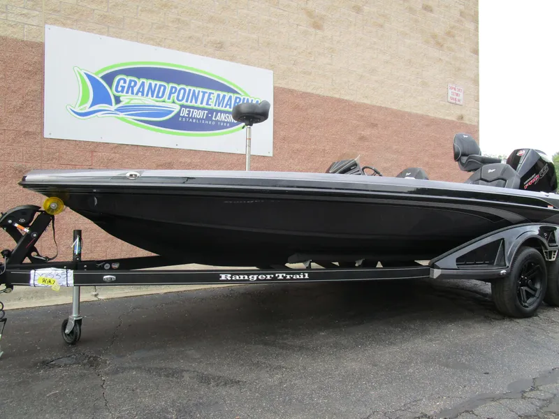 Slide: The Image of 2025 Ranger Z520 boat on trailer at Grand Pointe Marina. - 2