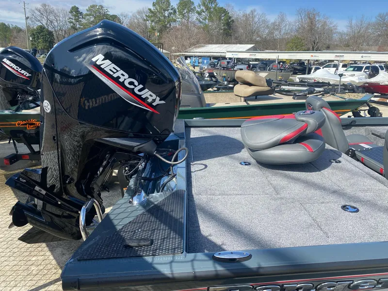 Slide: The Image of 2025 Ranger RT178 boat with Mercury engine, featuring spacious deck and seating. - 4