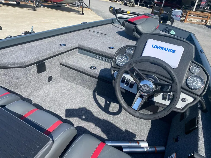 Slide: The Image of 2025 Ranger RT178 boat interior with steering wheel and Lowrance display. - 5