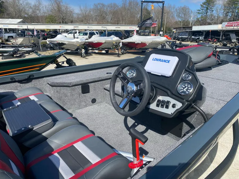 Slide: The Image of 2025 Ranger RT178 boat interior with steering wheel and Lowrance display. - 6