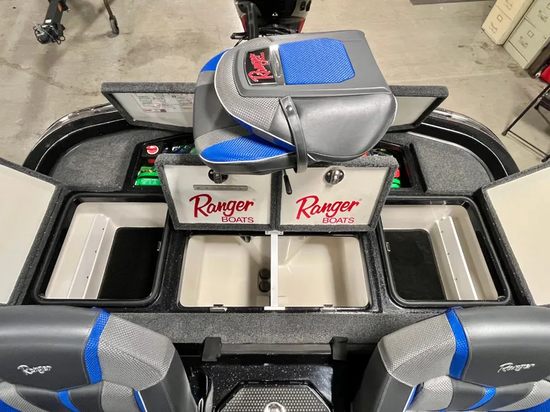 Slide: The Image of Interior of a 2025 Ranger Z520 boat featuring steering wheel and control panel. - 9