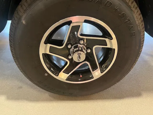 Slide: The Image of 2025 Ranger RT178 wheel with black and silver alloy rim design. - 16