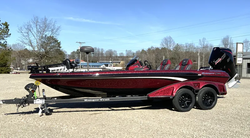 The Image of 2025 Ranger Z520 bass boat on trailer, parked outdoors. - 0
