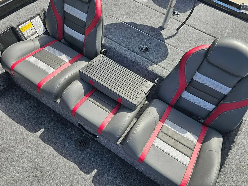 Slide: The Image of 2025 Ranger RT178 boat seats with red and gray upholstery, featuring a central storage compartment. - 16