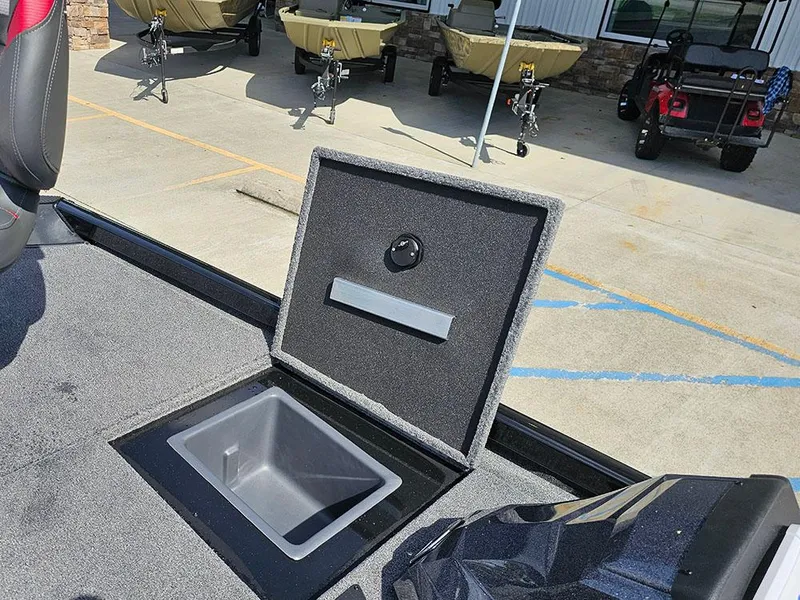 Slide: The Image of 2025 Ranger RT178 boat storage compartment open, showcasing interior design and functionality. - 18