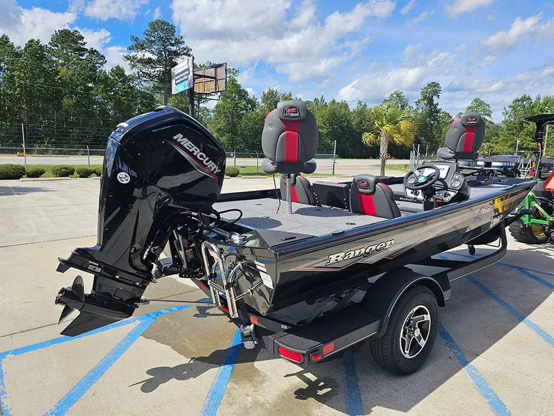 Slide: The Image of 2025 Ranger RT178 boat with Mercury engine in parking lot. - 7