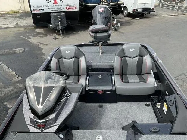 Slide: The Image of 2025 Ranger Z520 boat interior with dual seats and sleek design. - 5