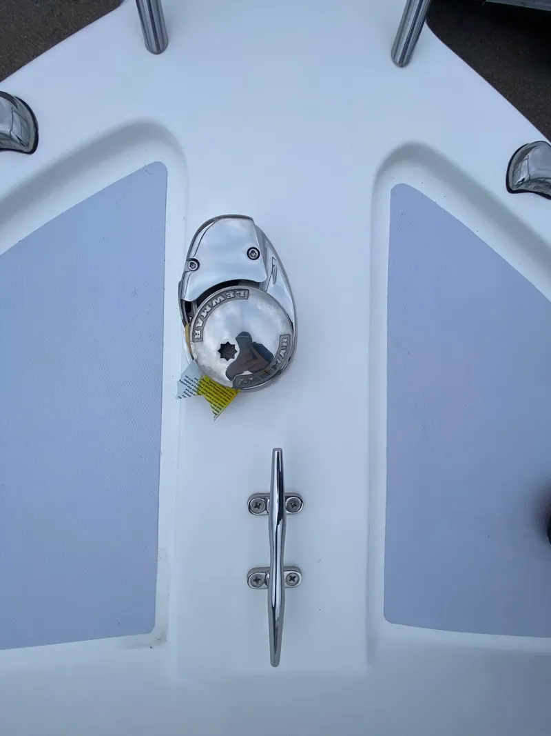 Slide: The Image of Close-up of 2025 NorthCoast 235 HT boat deck with anchor winch. - 7